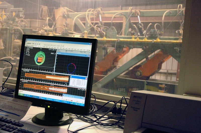 Timber is processed in high-tech, low-waste mills where lasers scan logs in three dimensions, computers decide the maximum number of boards, and every inch of log, down to the chips and sawdust, is put to use. Many mills generate their own electrical energy from these wood by-products. Photo: Courtesy of Oregon Forest Resources Institute.