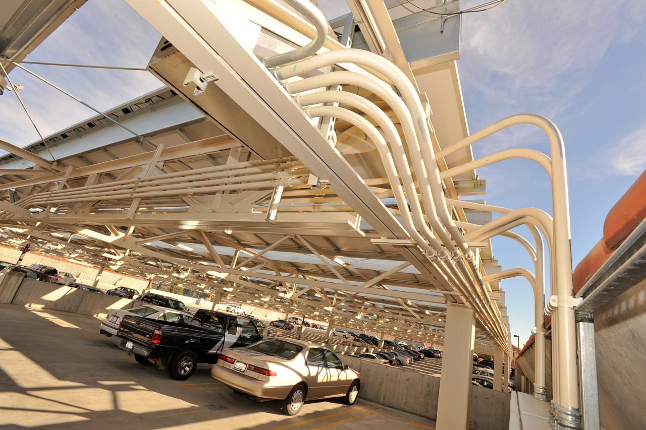 The infrastructure of the solar PV system does double duty by acting as sun shades on parking structure roof tops at SCU. (Photo courtesy Santa Clara University)