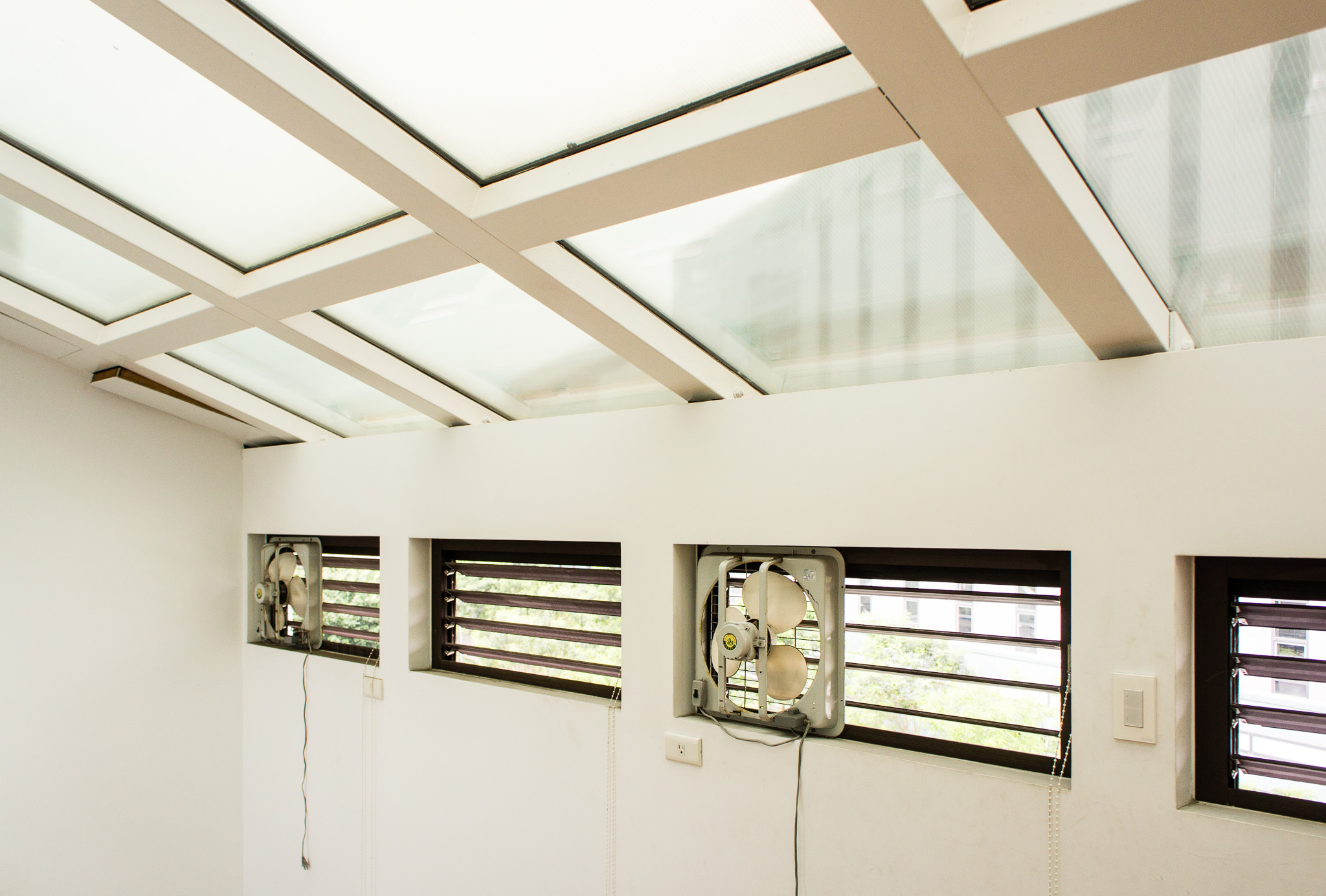 MEGA House, Taipei, Taiwan: A close-up view of the operable vents supplemented by mechanical fans at the top of the solar chimney. (Photo by Mignon O’Young)