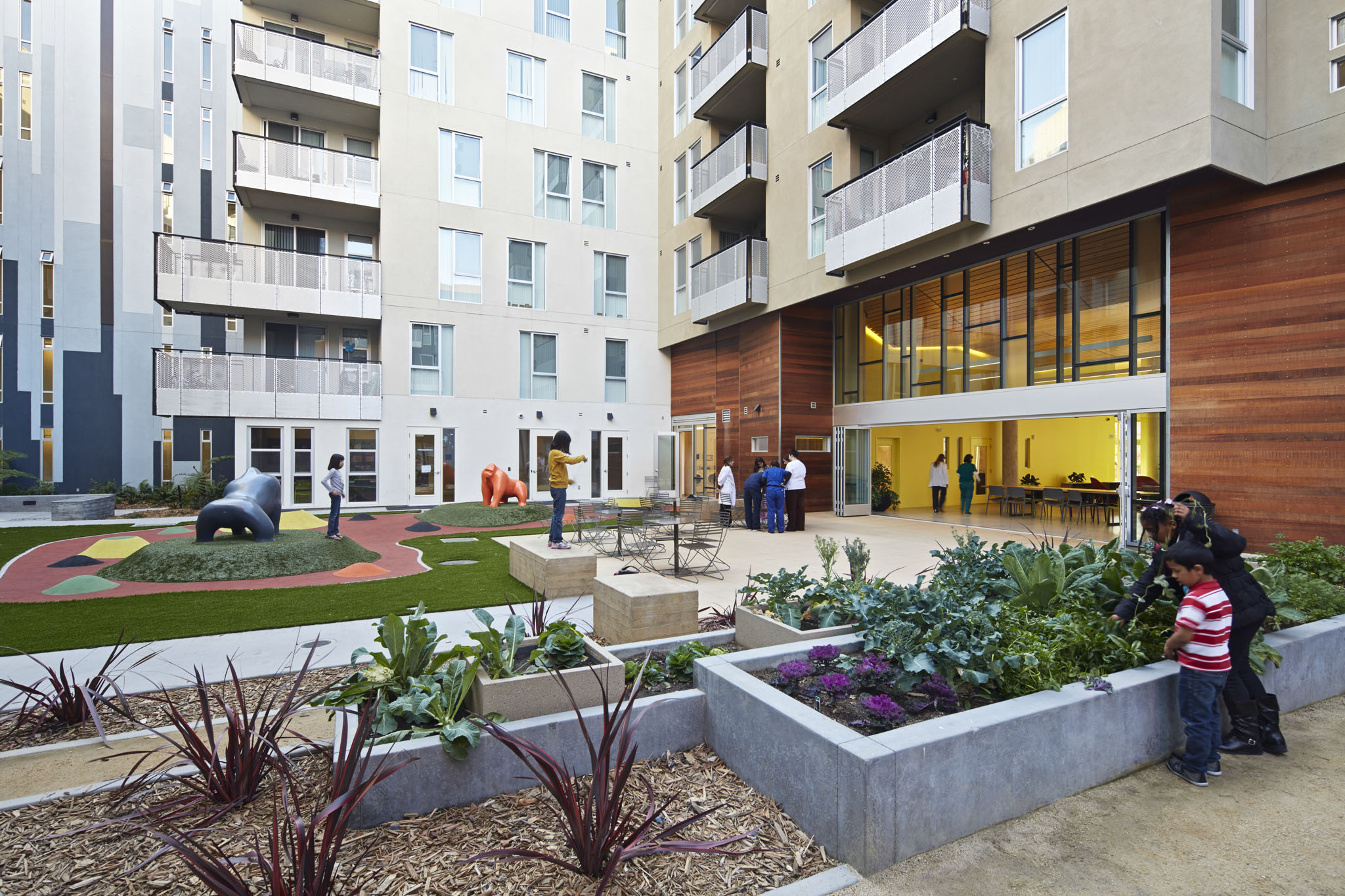 Raised beds for planting vegetables allow for easy gardening for the residents at Station Center Family Housing. (Photo by Bruce Damonte)