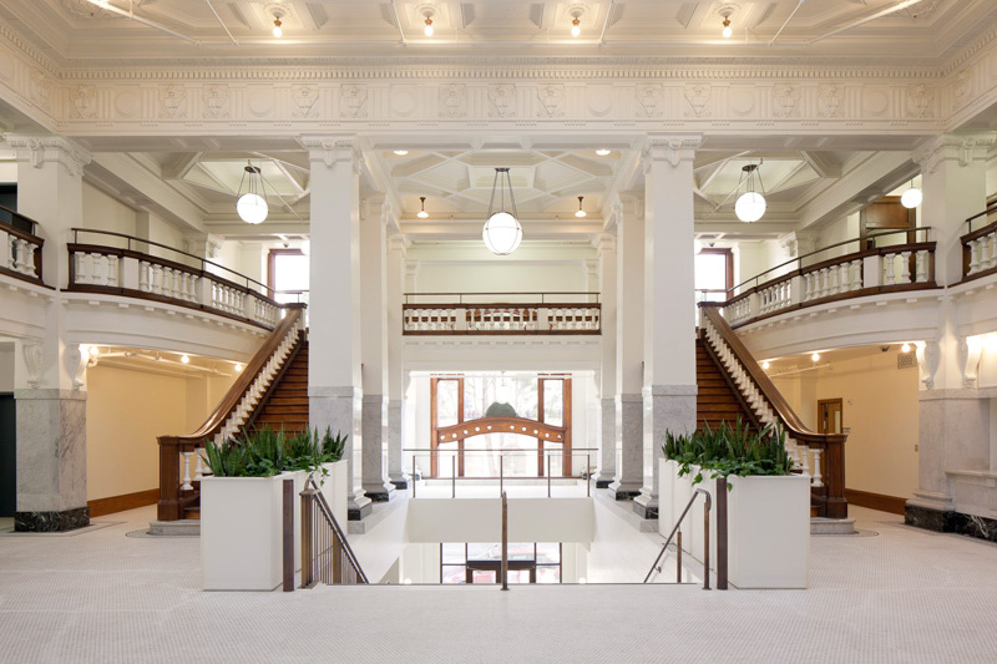 Kelly Cullen Community’s two-story lobby retains much of its original architectural details and has been restored to its original glory. (Photo by Mark Luthringer)