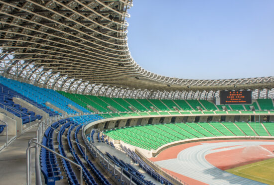 Taiwan National Stadium: the canopy roof’s spiraling lattice work cantilevers from its base and wraps up, over, and back down again. (Photo by Mignon O’Young)