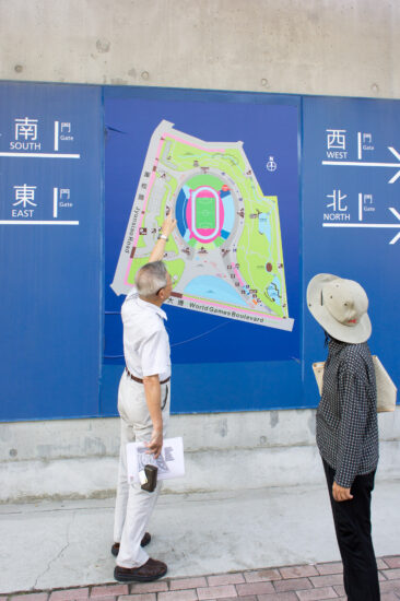 Kun Shan University’s Professor Chi-Hong Ho points to the site map during his in-depth tour of the Taiwan National Stadium. (Photo by Mignon O’Young)