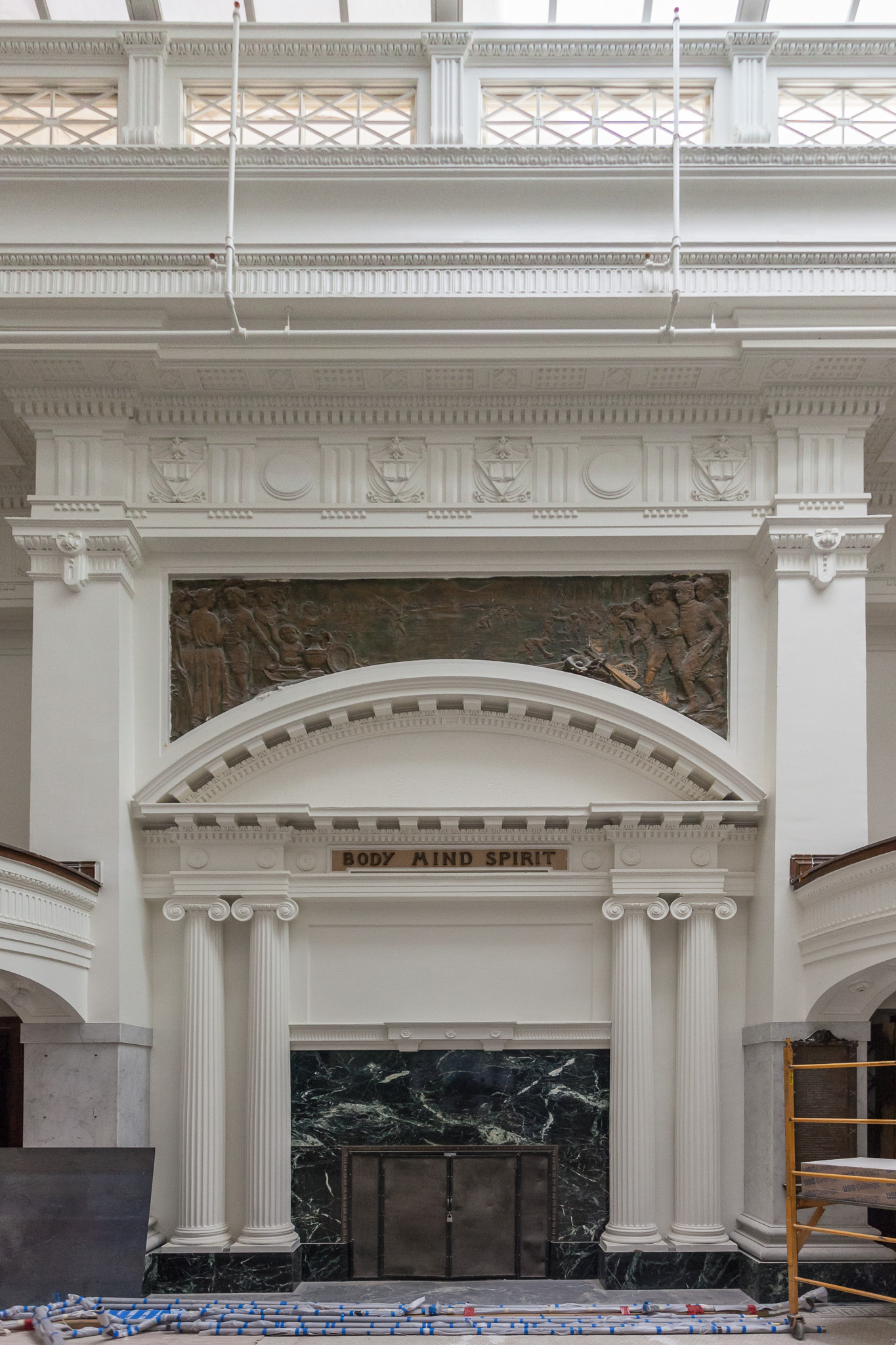 The words “body, mind, spirit” grace the top of the centerpiece which used to house a fireplace opposite of the grand staircase in Kelly Cullen Community. (Photo by Oliver Shay)