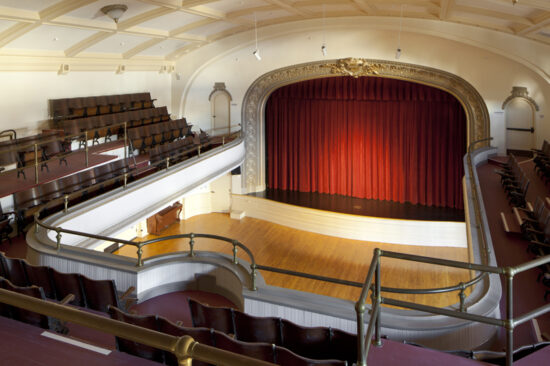 View of the finished auditorium from the balcony level with its original seating at Kelly Cullen Community. (Photo by Mark Luthringer)