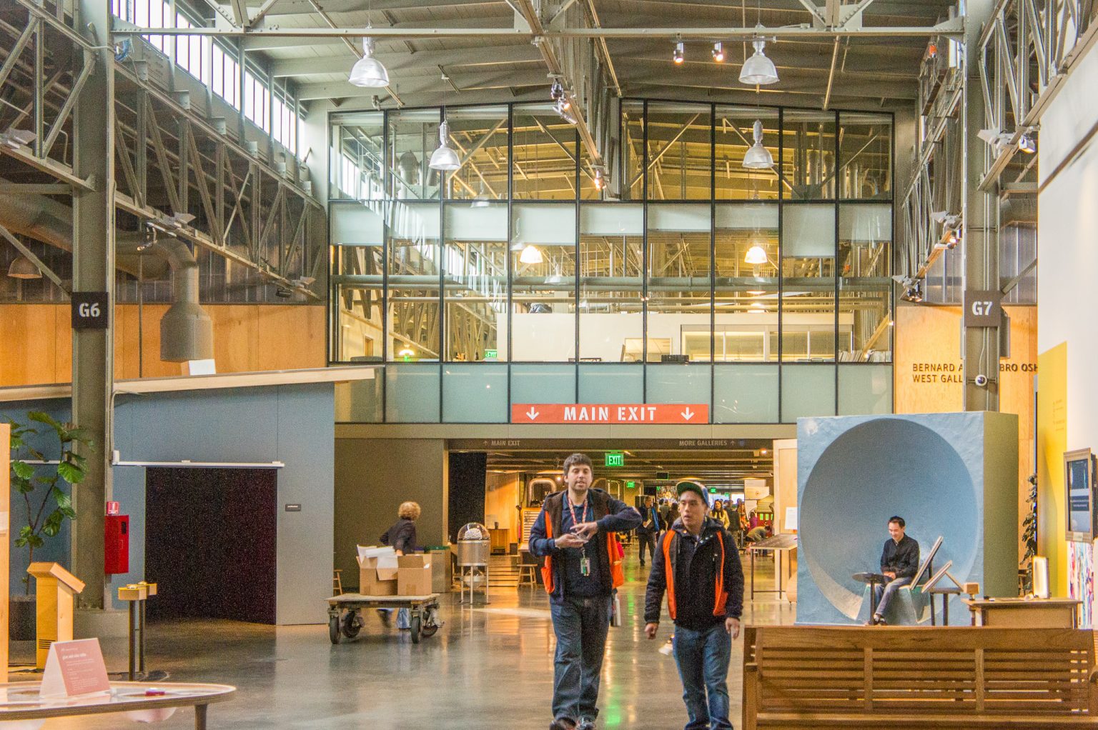 Even on a cloudy day, natural daylighting coming through the clerestories provides enough general lighting for the interior of the Exploratorium.  Accent lighting is mostly provided by the exhibit displays, which have their own lighting sources. (Photo by Mignon O’Young)
