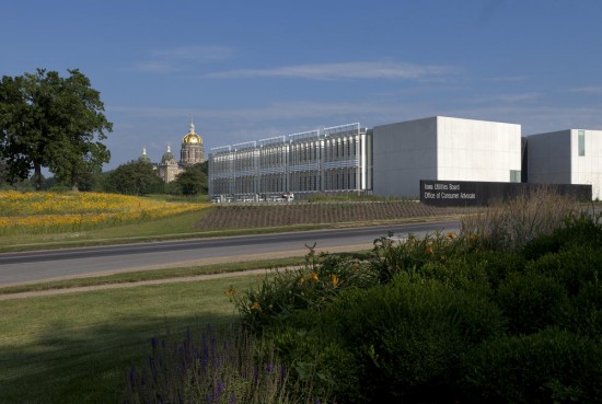 An exterior view of the Iowa Utilities Board/Office of the Consumer Advocate Office Building designed by BNIM and the Capital Building beyond. (Photo by Assassi)