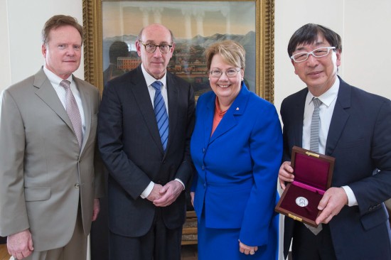 The recipients of the 2014 Thomas Jefferson Foundation Medals -- Jim Webb (Citizen Leadership), Kenneth Feinberg (Law), and Toyo Ito (Architecture) with Teresa Sullivan, President of the University of Virginia. (Photo by Sanjay Suchak)