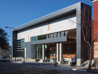 The new NZE West Berkeley Public Library nicely anchors the urban street frontage on University Avenue in Berkeley, California