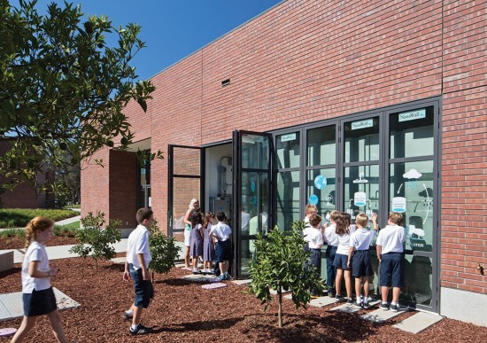 WRNS Studio architects cleverly designed the plumbing room housing the rainwater harvesting and greywater systems to serve as a visual and accessible classroom at the Stevens Library at Sacred Heart Schools. (Photo by Bruce Damonte)