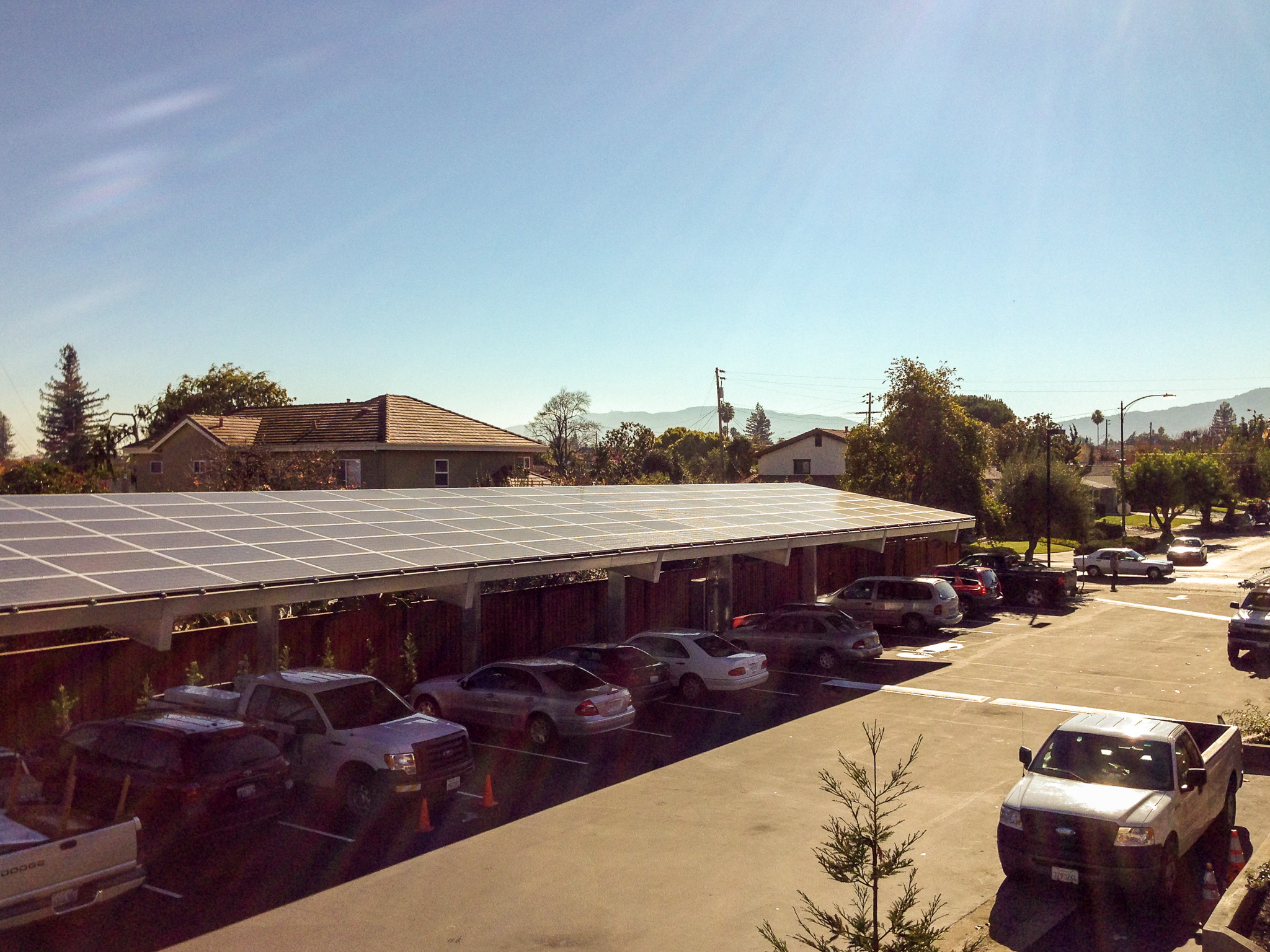 The 182 kW solar photovoltaic system sits atop the carports at Clarendon Street Apartments in San Jose, California. (Photo courtesy Arbor Building Group, Inc.)