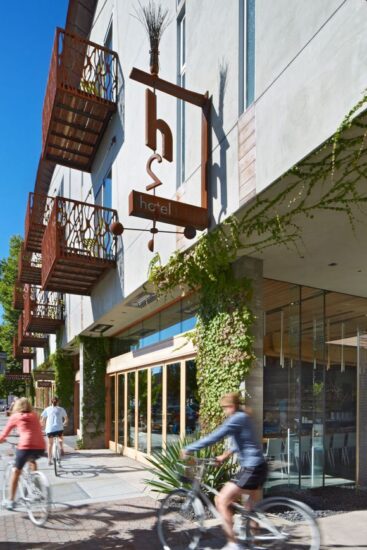 The h2hotel in Healdsburg, California sports an eye-catching sign and glass facades accented with crawling vines. (Photo by Bruce Damonte)