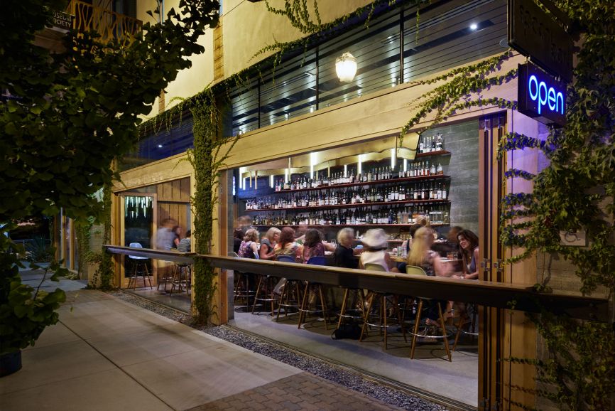 Spoonbar!, the hotel’s Mediterranean restaurant opens up to the sidewalk and showcases many fixtures and furniture pieces custom-made by various artists including Oakland-based Pacassa Studios. (Photo by Bruce Damonte)