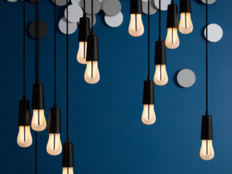 A cluster of Plumen 002 LED bulbs make for a fun, energy efficient, and sculptural lighting display