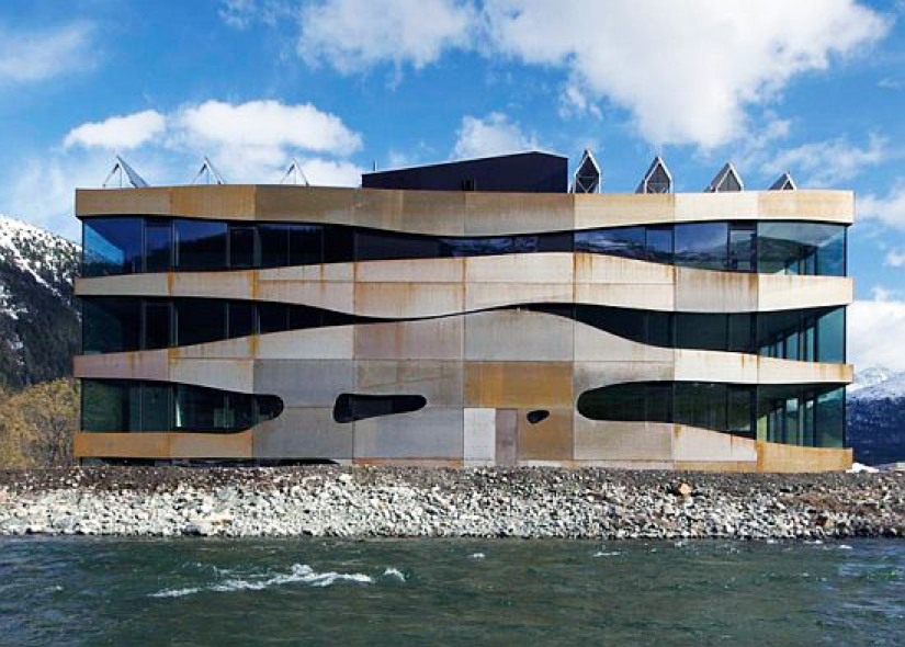 Building design can be planned with solar energy in mind: Commercial Building Islas by Mierta & Kurt Lazzarini Architekten. Source: http://www.ecochunk.com/2573/2012/09/20/office-building-in-switzerland-works-like-a-battery-storing-renewable-energy/