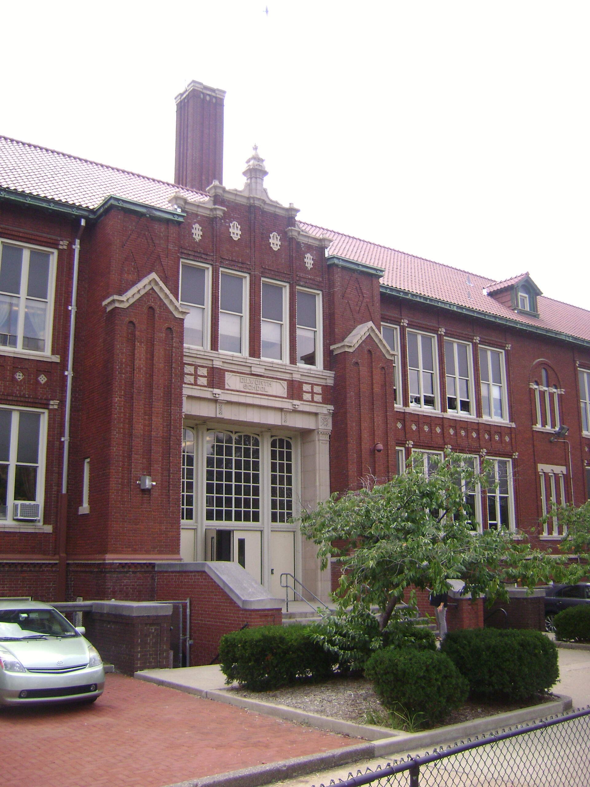 Dilworth Elementary School (Dilworth Traditional Academy), an active facility of cohort participant Pittsburgh Public Schools (PPS). It serves as a direct documentary example of the cohort's focal demographic: century-old, aging public school infrastructure in Pennsylvania requiring healthy materials retrofits rather than full-scale demolition.
